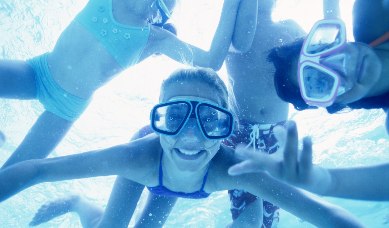 people playing underwater