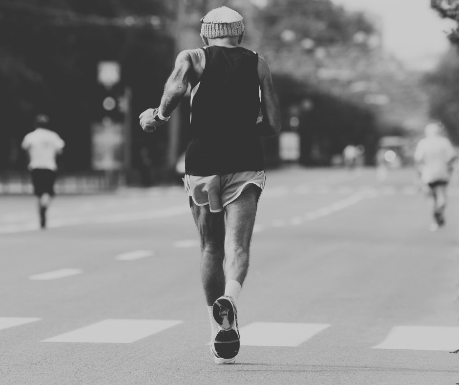 Older man running in a race - Mindful Soul Center Magazine